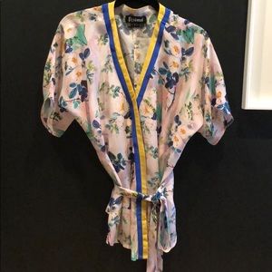 Silk look floral print wrap blouse.